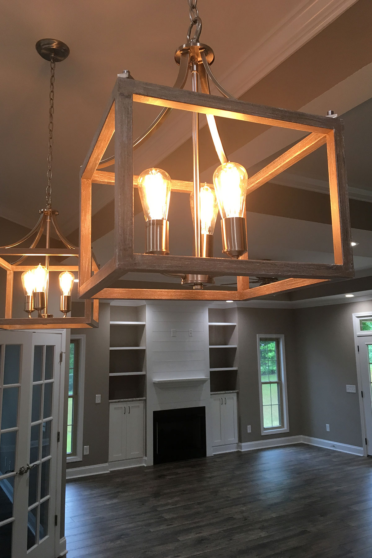 trumark construction custom home riverwatch2 kitchen pendant lights