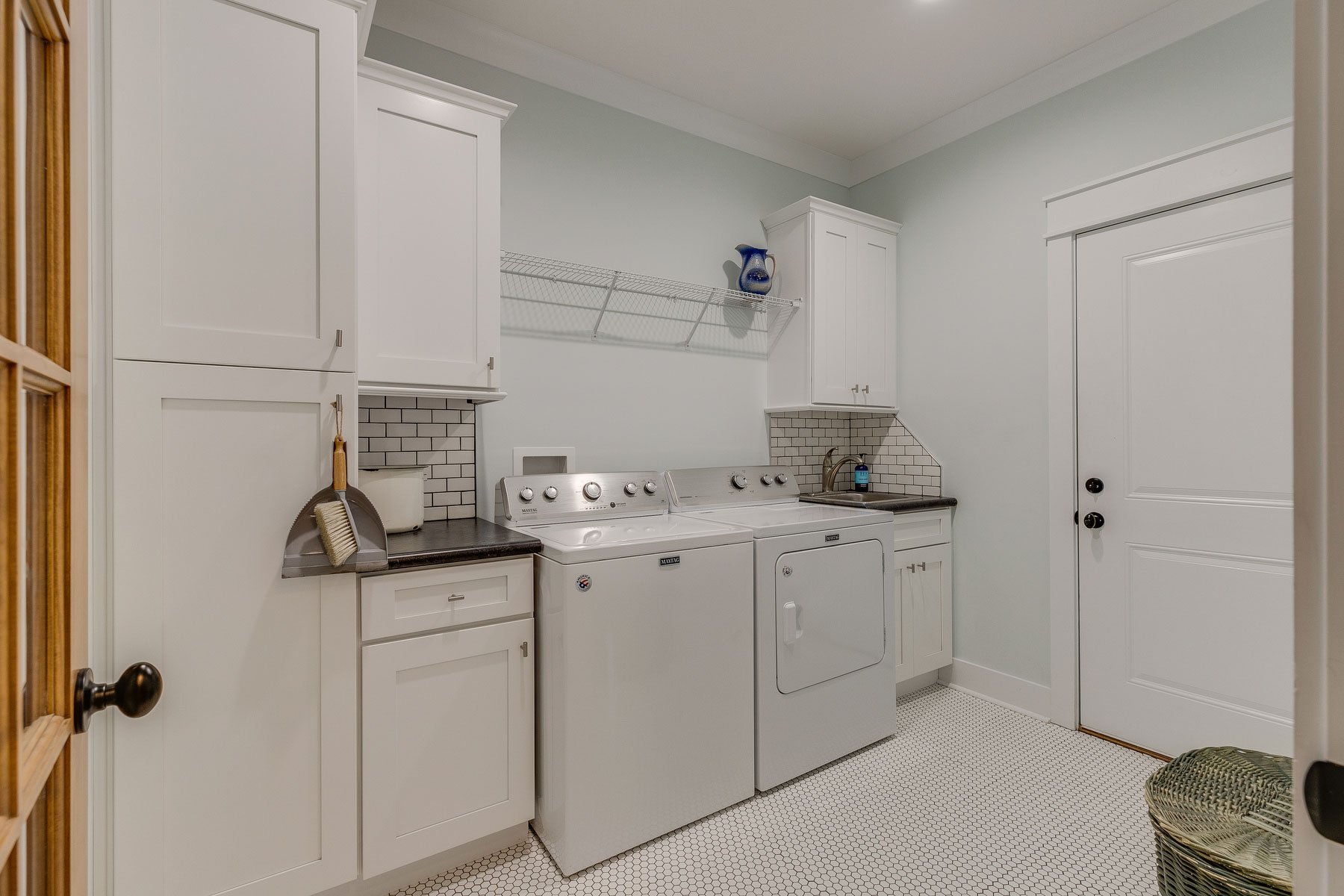 trumark construction custom home riverwatch laundry room